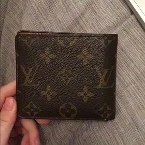 Louis Vuitton Unisex Wallet.